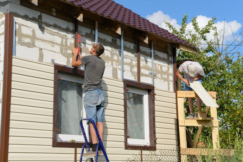 Expert Vinyl Siding Repair in Action